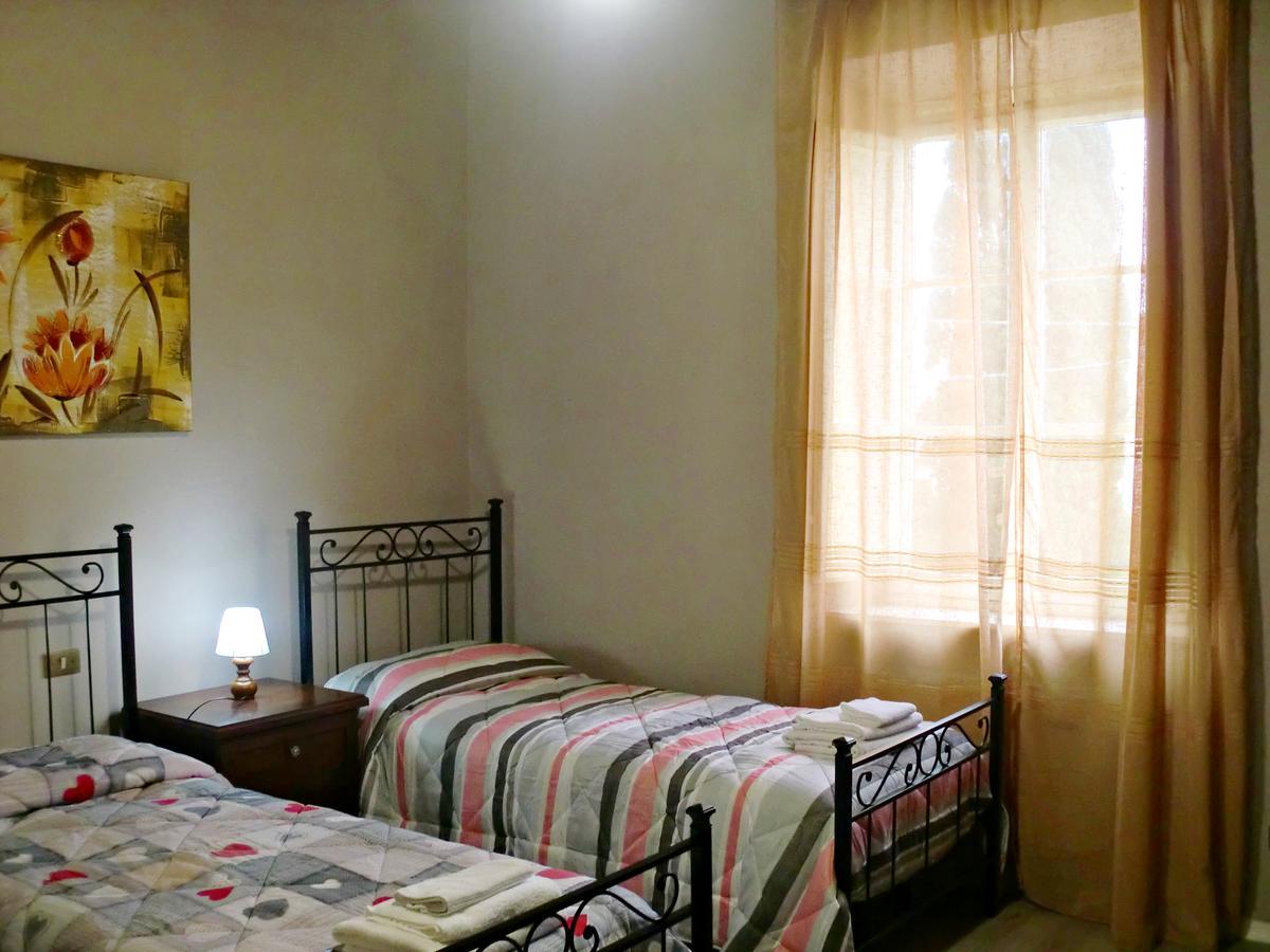 Tuscan Sun Holiday Apartments Lucca Værelse billede